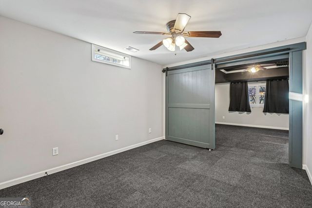 701 Whisper Wind Court, Woodstock, GA 30189