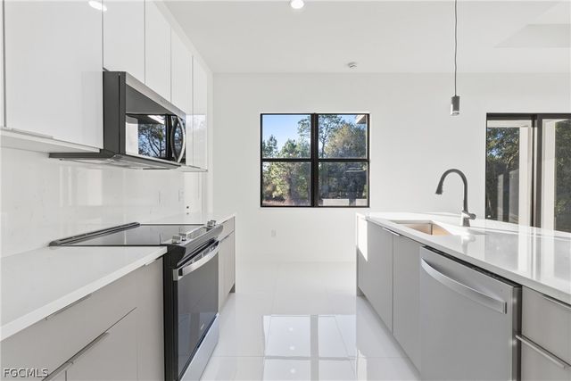 566 Eisenhower BLVD, Lehigh Acres, FL 33974