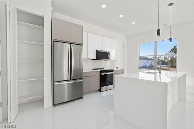 566 Eisenhower BLVD, Lehigh Acres, FL 33974