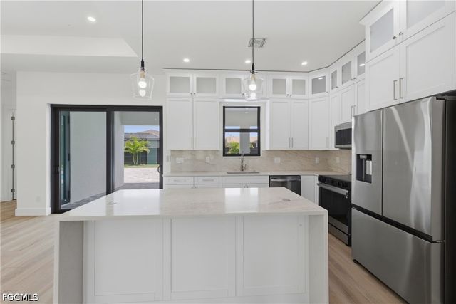 3303 SW 12th AVE, Cape Coral, FL 33914