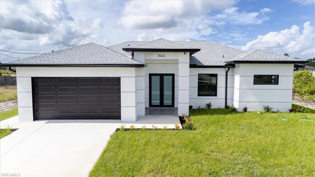 344 Parkman AVE, LEHIGH ACRES, FL 33974 — exterior