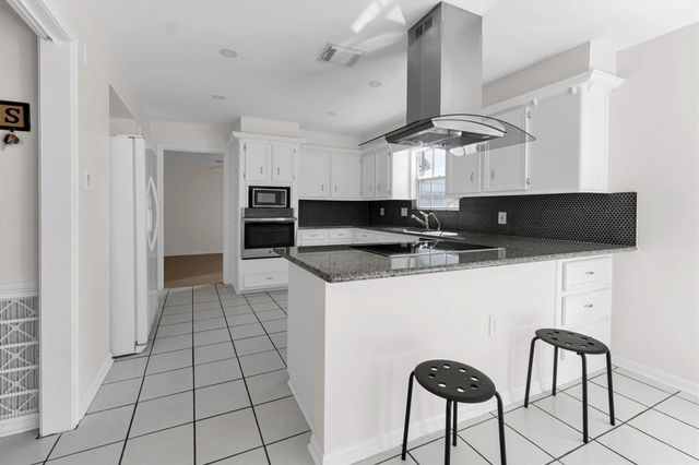 19535 Enchanted Oaks Drive, Spring, TX 77388