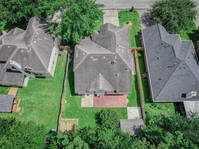 21812 Grand Lancelot Drive, Kingwood, TX 77339