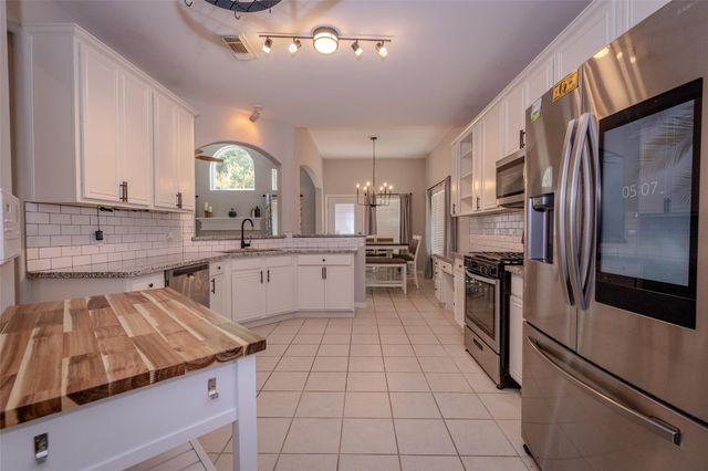 21812 Grand Lancelot Drive, Kingwood, TX 77339