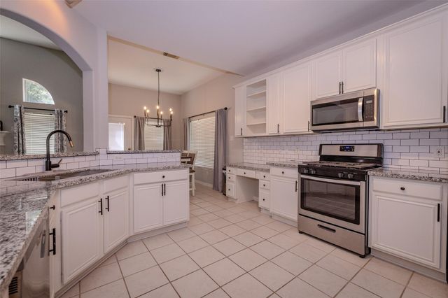 21812 Grand Lancelot Drive, Kingwood, TX 77339