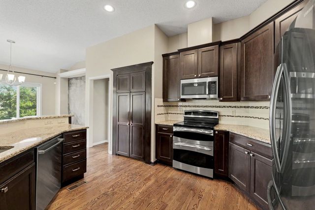 606 E Woodstone Ct, Andover, KS 67002
