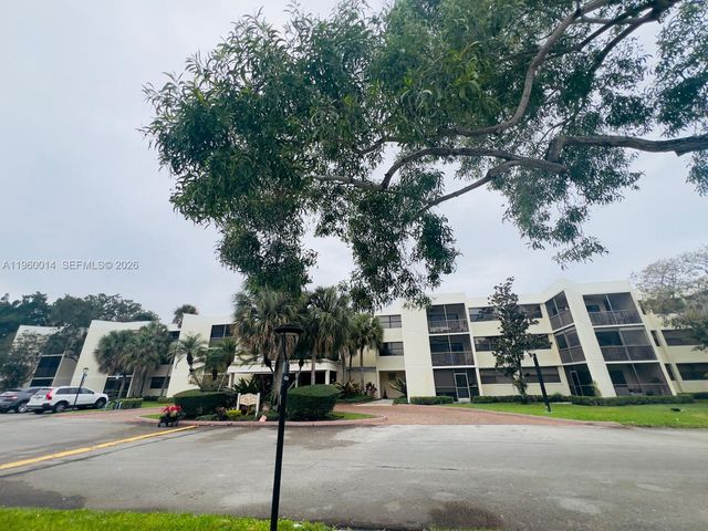 491 Racquet Club Road 211, Weston, FL 33326