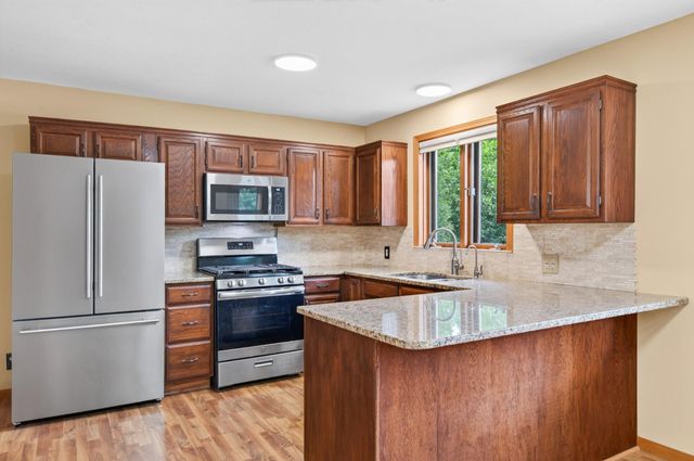 7712 Riverdale Drive N, Brooklyn Park, MN 55444
