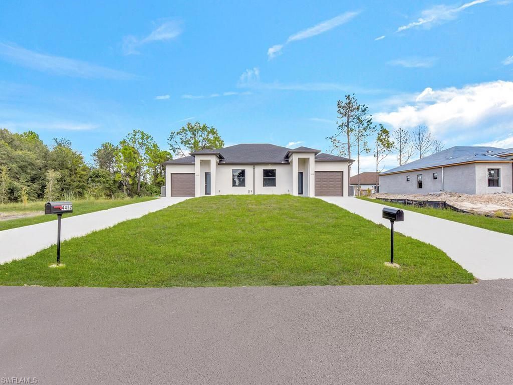 4709/4711 21 ST SW, LEHIGH ACRES, FL 33973 — exterior