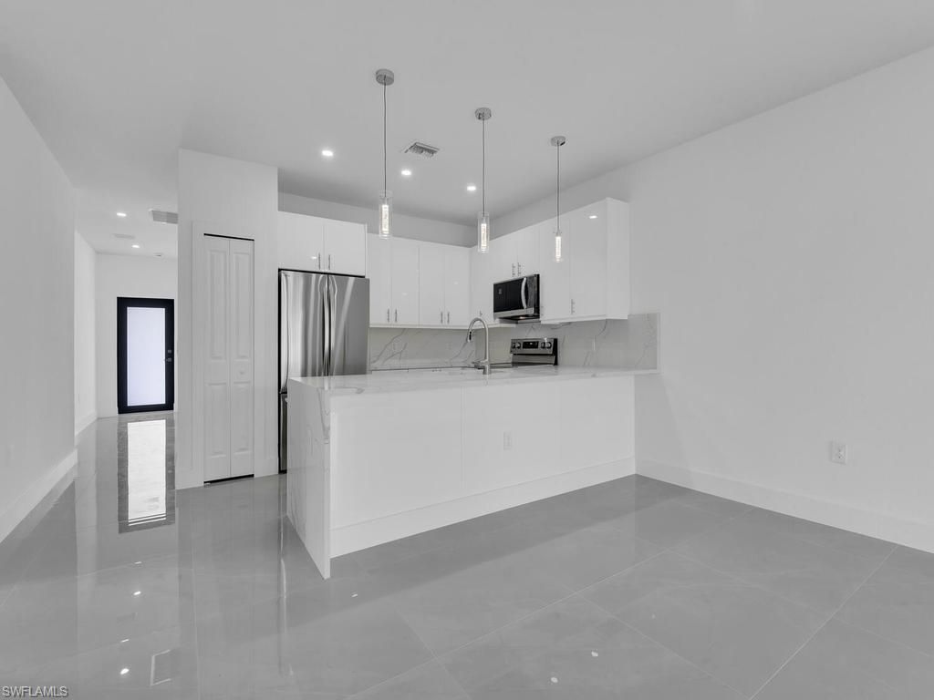 4709/4711 21 ST SW, LEHIGH ACRES, FL 33973 — photo 4