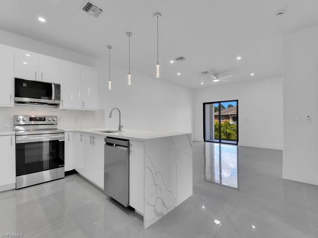 4709/4711 21 ST SW, LEHIGH ACRES, FL 33973 — photo 5