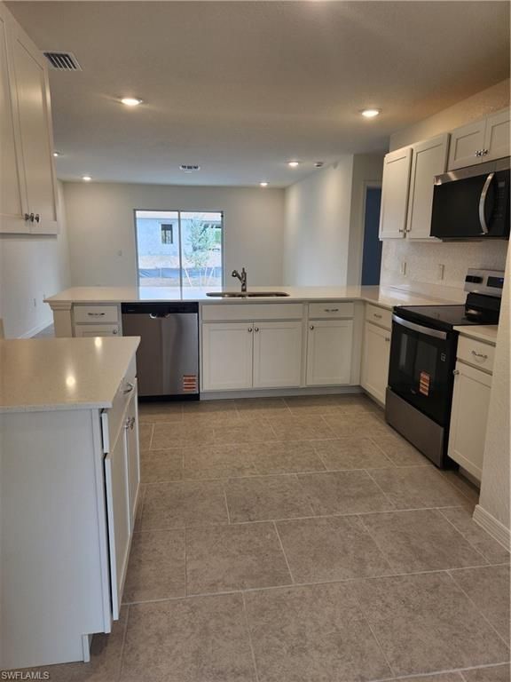 2616 5th ST SW, LEHIGH ACRES, FL 33976 — photo 2
