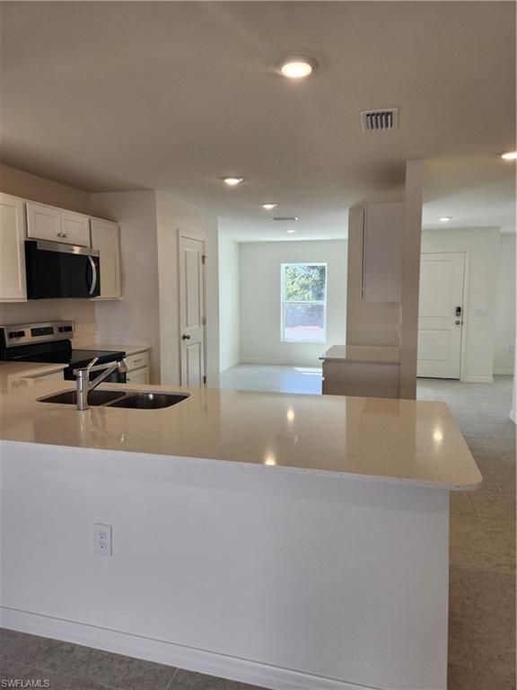 2616 5th ST SW, LEHIGH ACRES, FL 33976 — photo 3