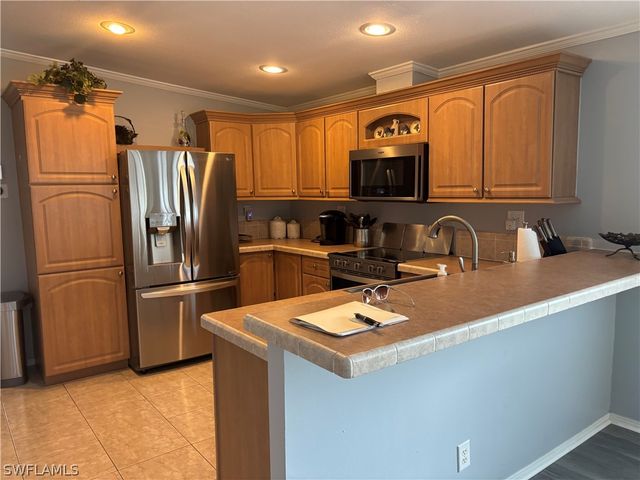12 Aquamarine AVE 12Q, Naples, FL 34114