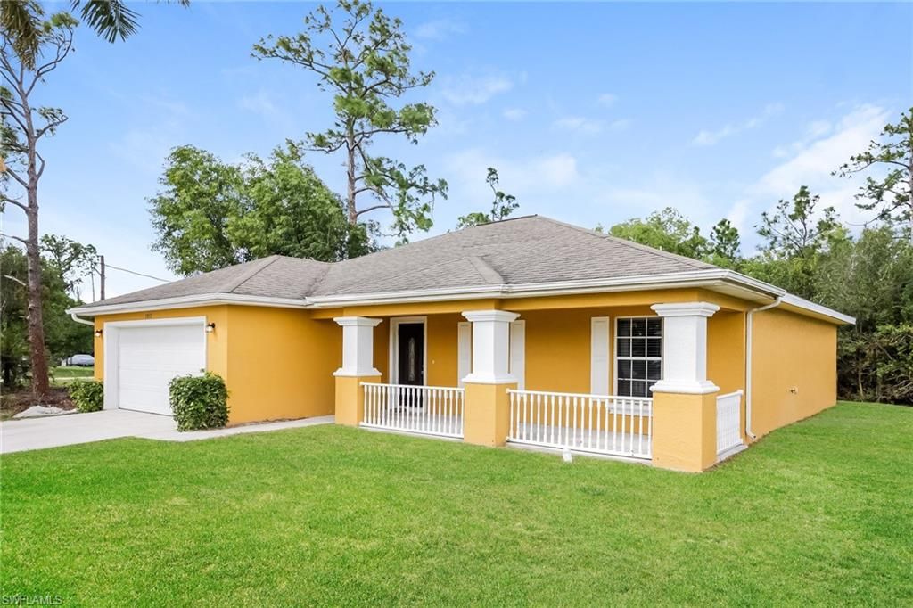 3812 14th ST W, LEHIGH ACRES, FL 33971 — photo 2