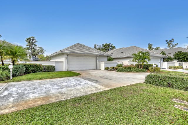 201 Orange Tree Drive, Atlantis, FL 33462