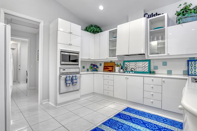 201 Orange Tree Drive, Atlantis, FL 33462