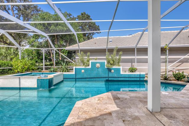 201 Orange Tree Drive, Atlantis, FL 33462