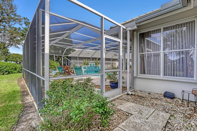 201 Orange Tree Drive, Atlantis, FL 33462