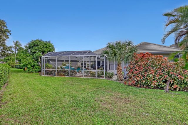 201 Orange Tree Drive, Atlantis, FL 33462