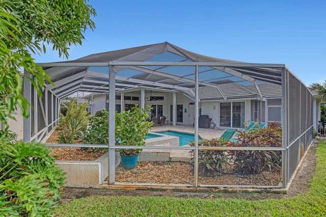 201 Orange Tree Drive, Atlantis, FL 33462