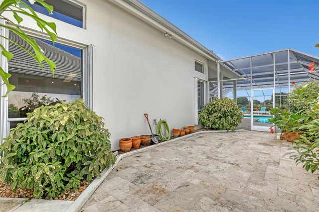 201 Orange Tree Drive, Atlantis, FL 33462