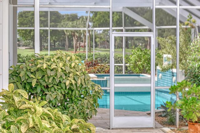 201 Orange Tree Drive, Atlantis, FL 33462