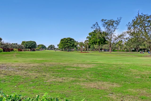 201 Orange Tree Drive, Atlantis, FL 33462