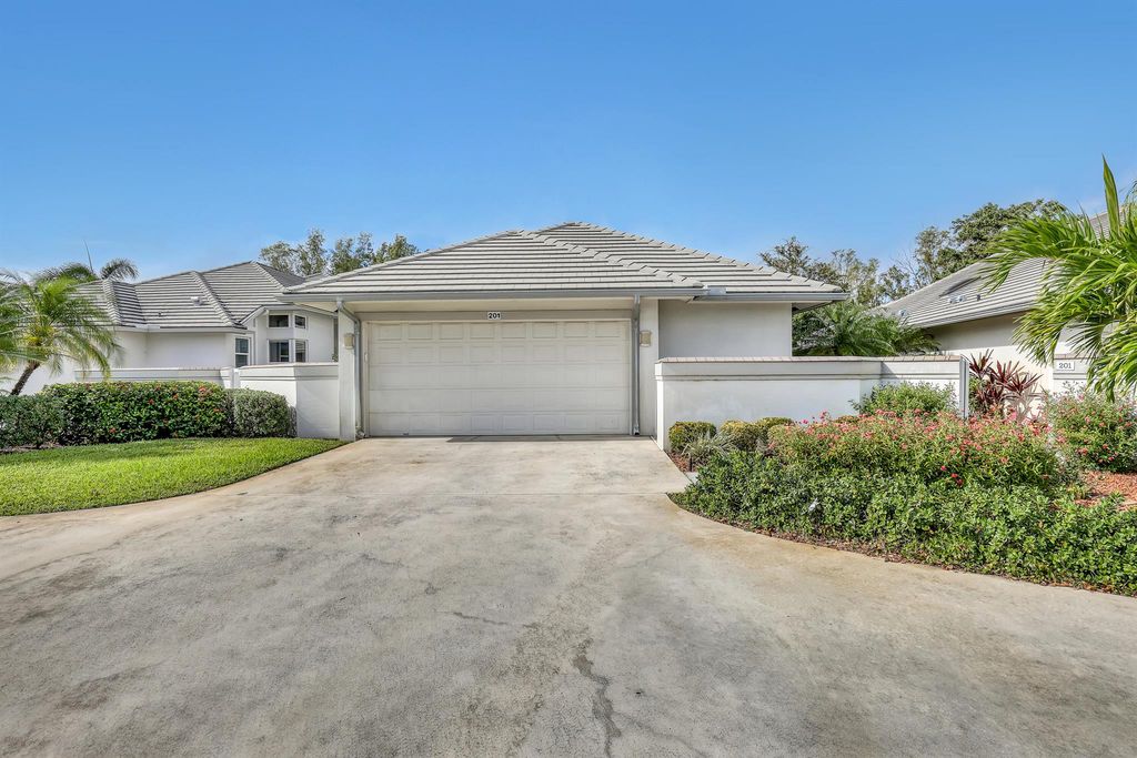 201 Orange Tree Drive, Atlantis, FL 33462