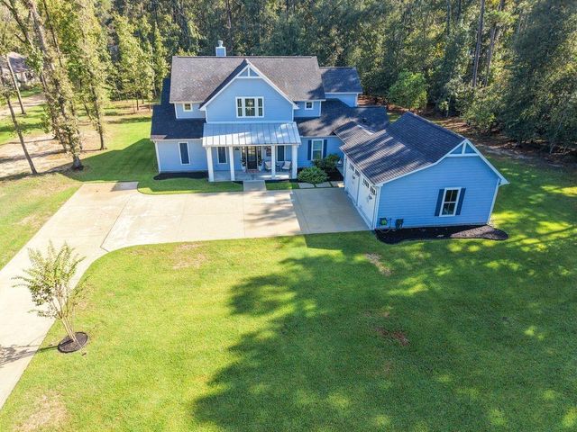 703 Lago Trace Drive, Huffman, TX 77336