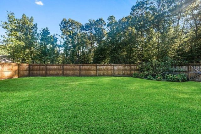 703 Lago Trace Drive, Huffman, TX 77336