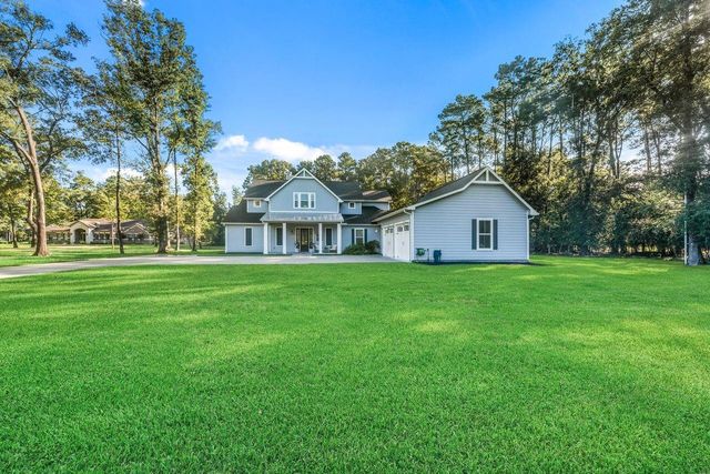 703 Lago Trace Drive, Huffman, TX 77336