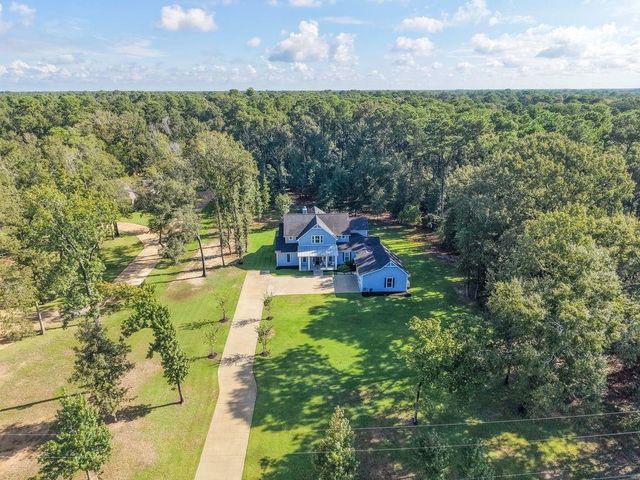 703 Lago Trace Drive, Huffman, TX 77336