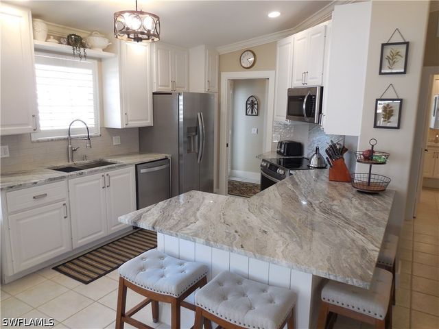 5441 Guadeloupe WAY, Naples, FL 34119