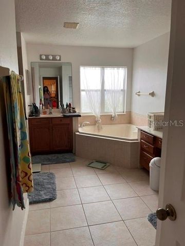 10049 SAVANNAH BLUFF LANE, Orlando, FL 32829