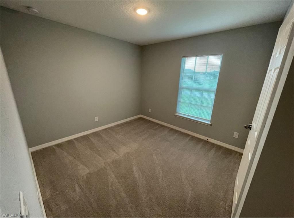 3108 64th ST W, LEHIGH ACRES, FL 33971 — photo 2