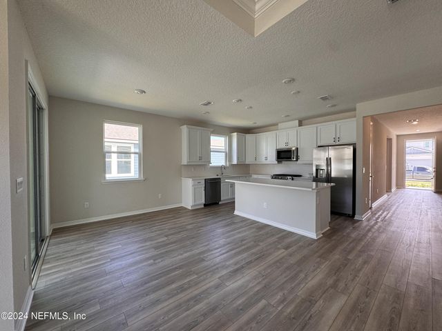 938 ROOSTER HOLLOW Way, Middleburg, FL 32068