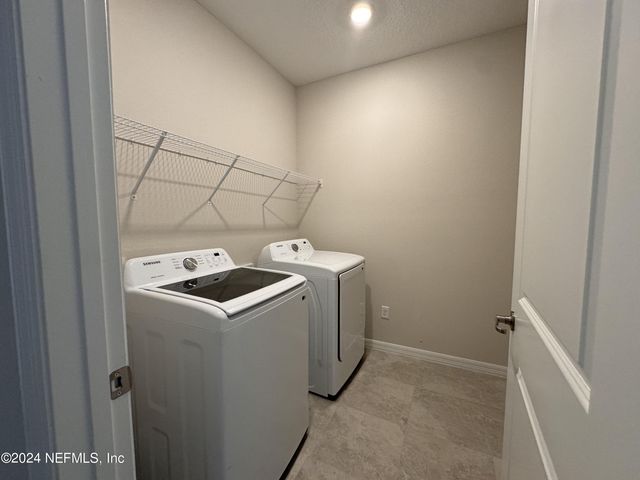 938 ROOSTER HOLLOW Way, Middleburg, FL 32068