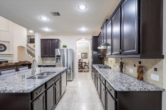 22002 Flashing Ridge Drive, Spring, TX 77389