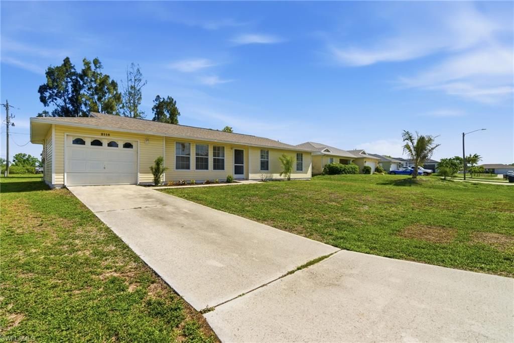 2115 NE 25th ST, CAPE CORAL, FL 33909 — exterior
