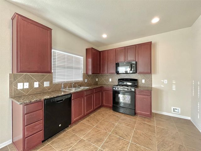 14903 Vinegrove Falls Court, Cypress, TX 77433