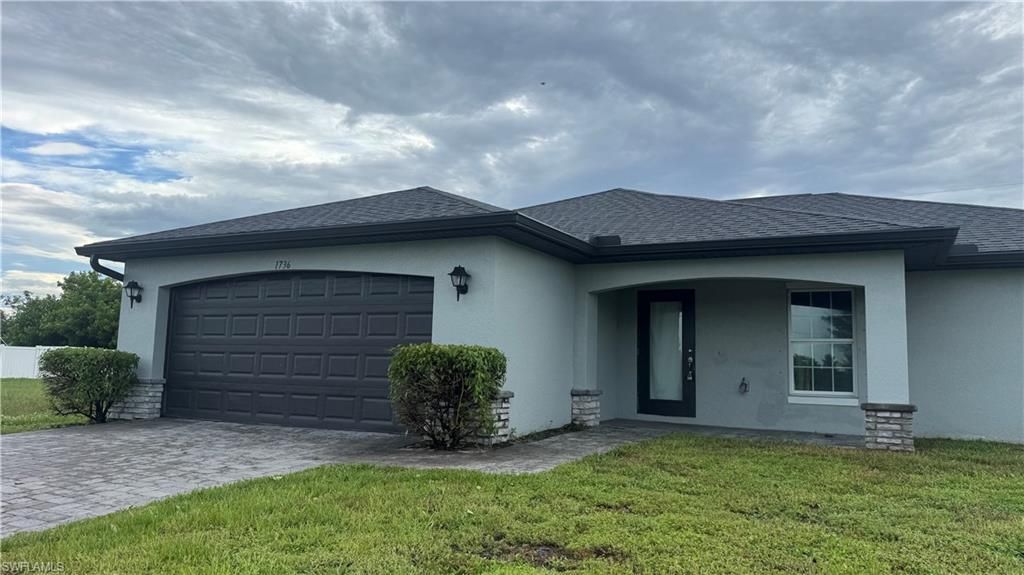 1736 NE 1st AVE, CAPE CORAL, FL 33909 — exterior