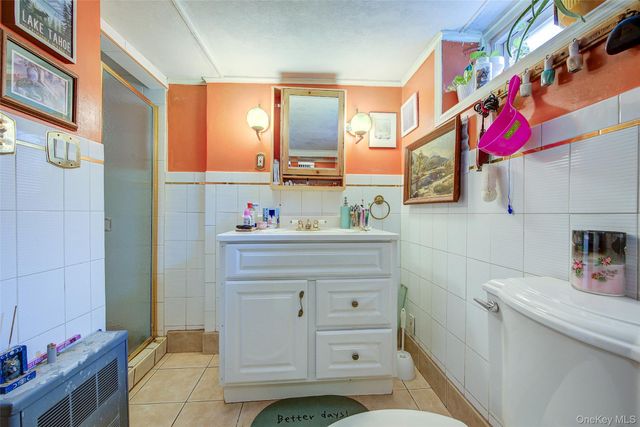 64-66 84th Place, Middle Village, NY 11379