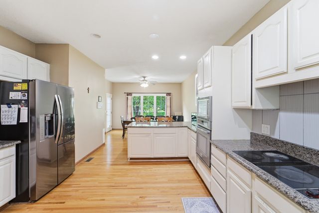13556 VILLAGE Court, Clive, IA 50325
