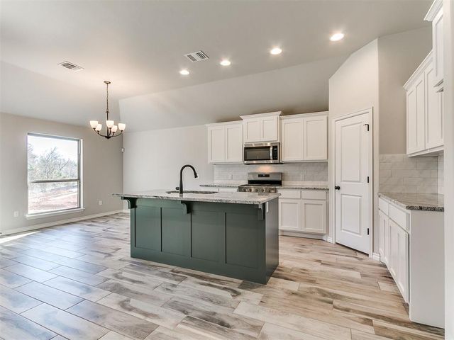 12028 Rockbed Drive, Yukon, OK 73099