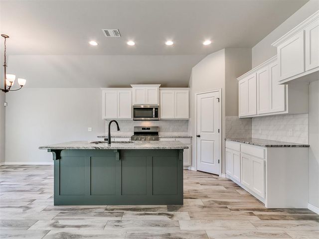 12028 Rockbed Drive, Yukon, OK 73099