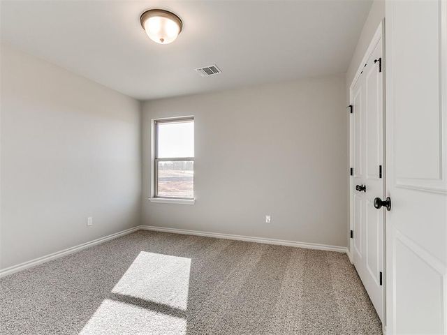 12028 Rockbed Drive, Yukon, OK 73099