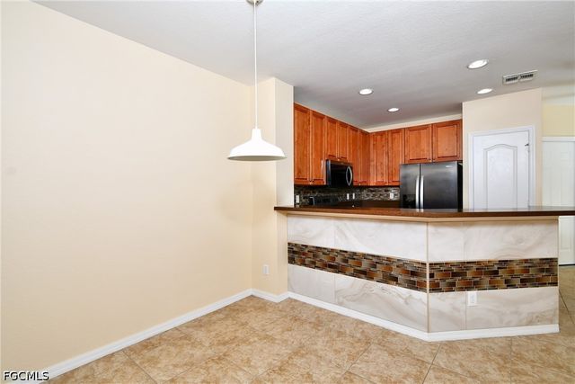 8585 Athena CT, Lehigh Acres, FL 33971