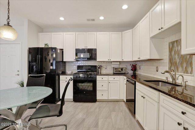 215 Bloomsbury Drive, Morganville, NJ 07751