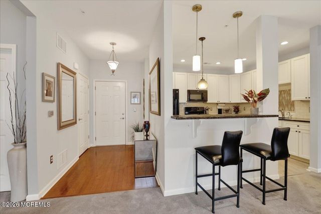 215 Bloomsbury Drive, Morganville, NJ 07751